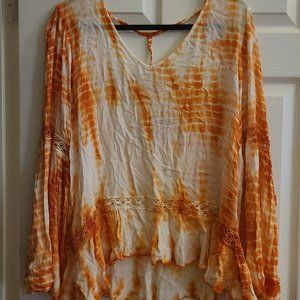 Woman's flowy top with back cut out